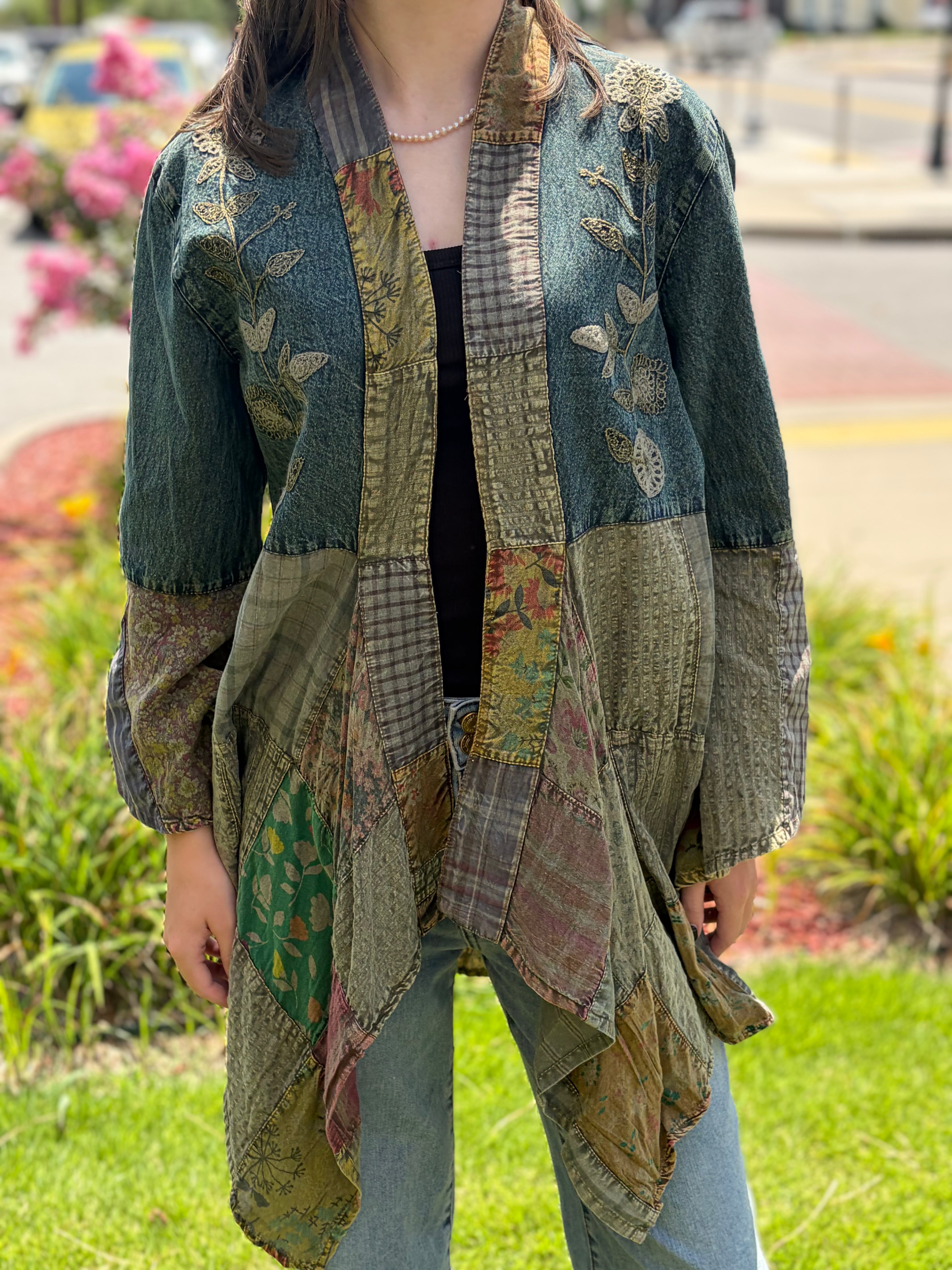Close-up front detail, embroidery and patchwork panels