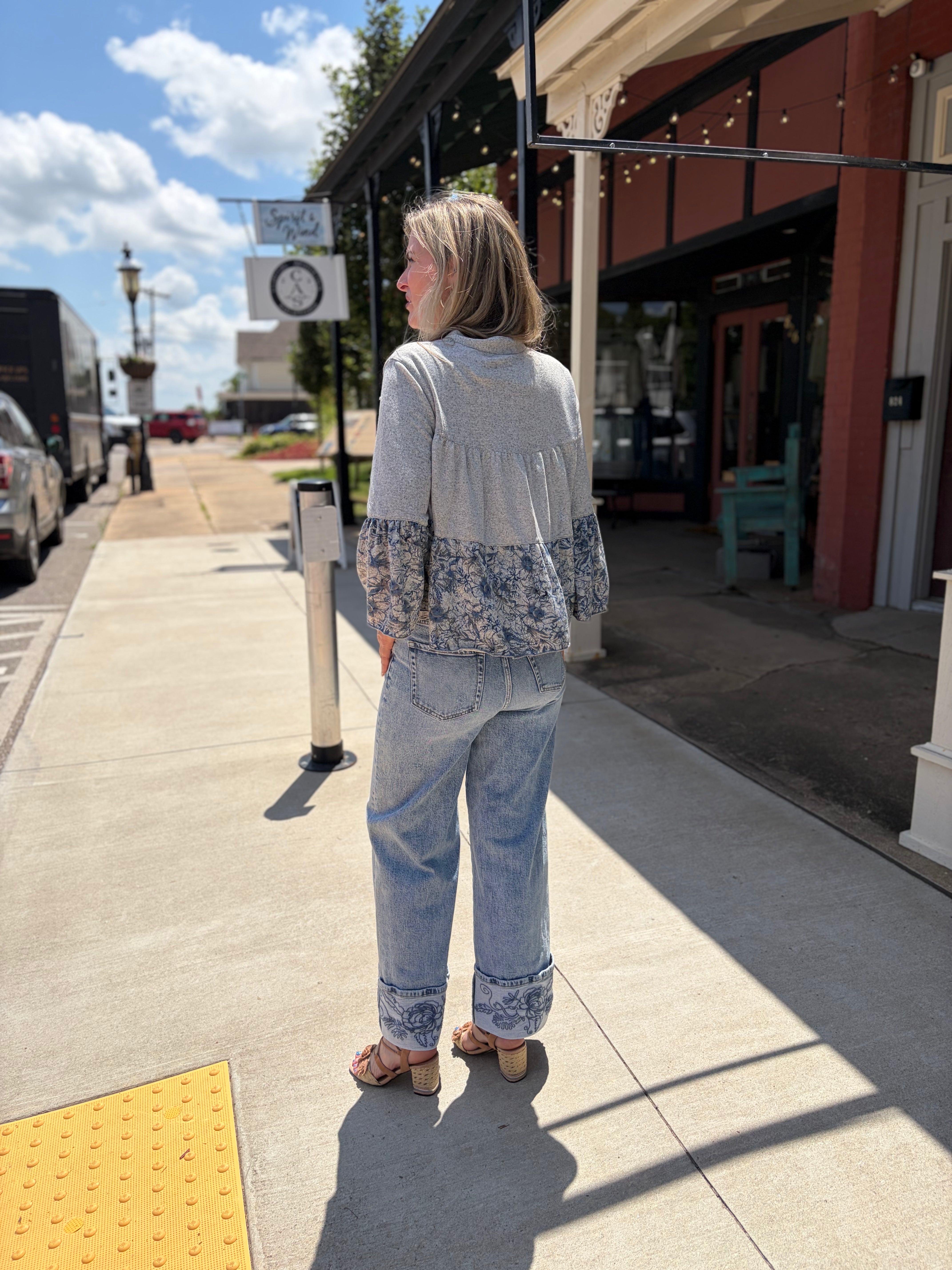 Back view, full outfit on sidewalk