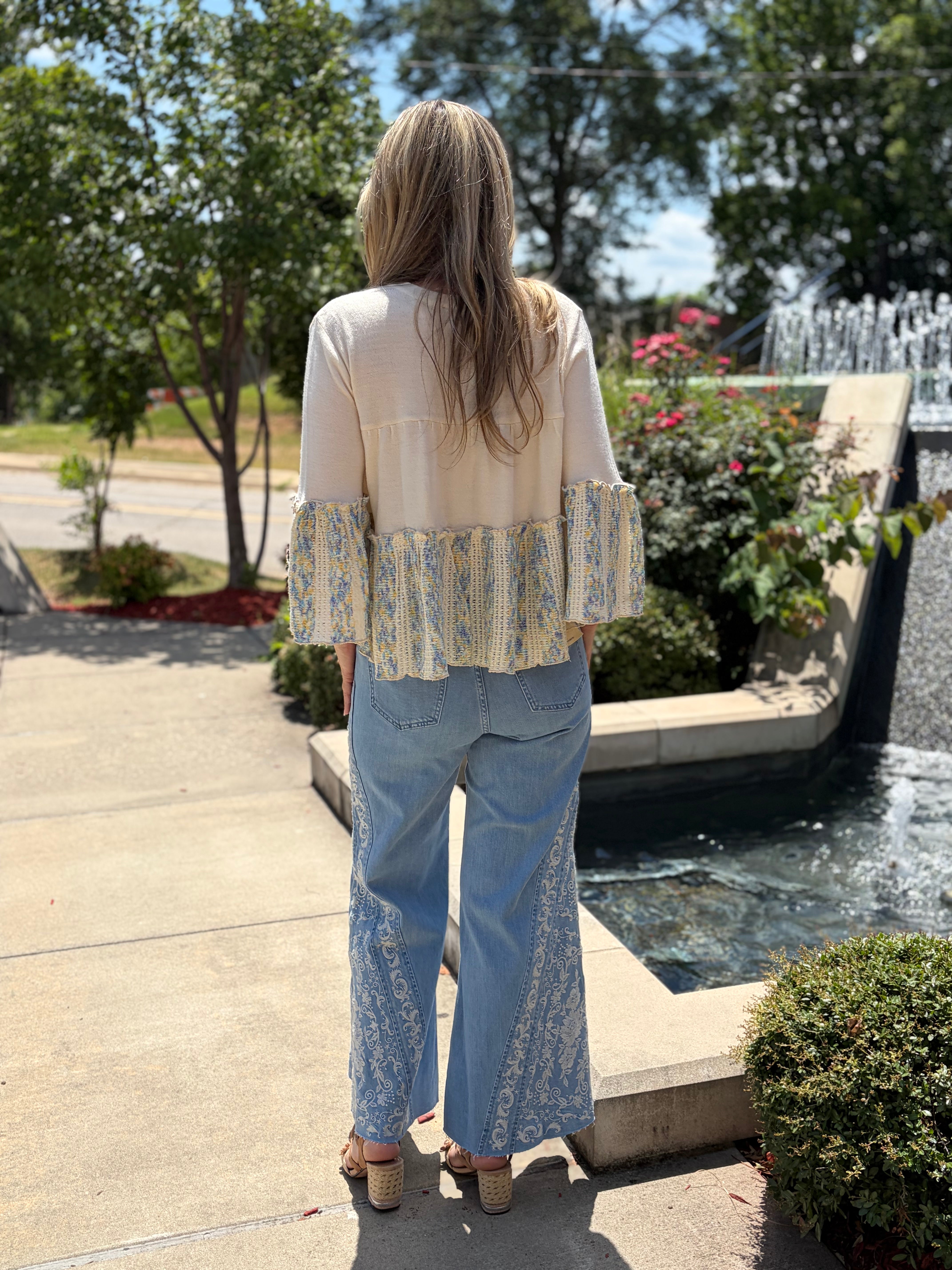 Back view, smocked printed back tier + ruffled bell sleeves