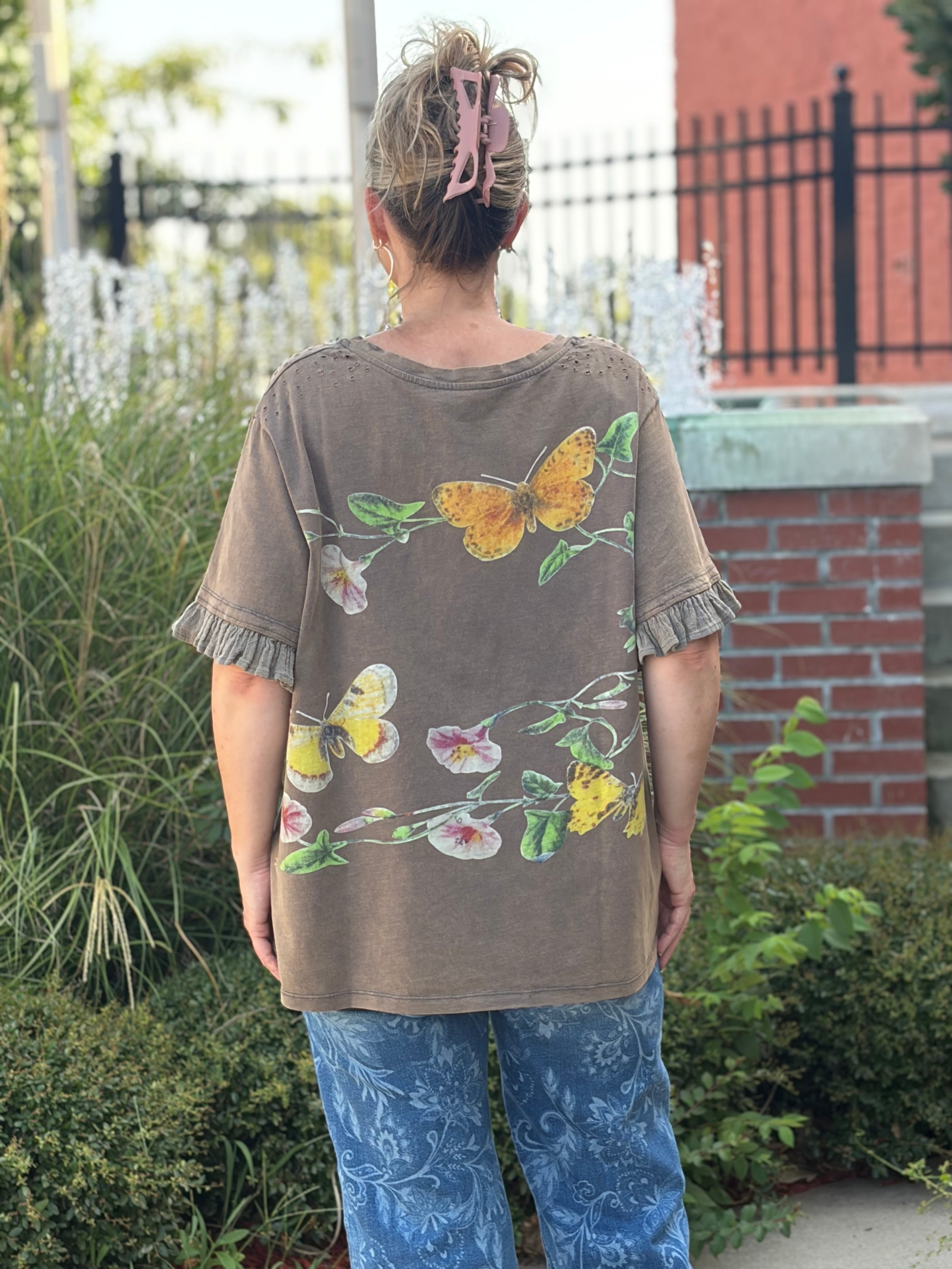 oversized butterfly and floral print, ruffle sleeves, distressed shoulder accents