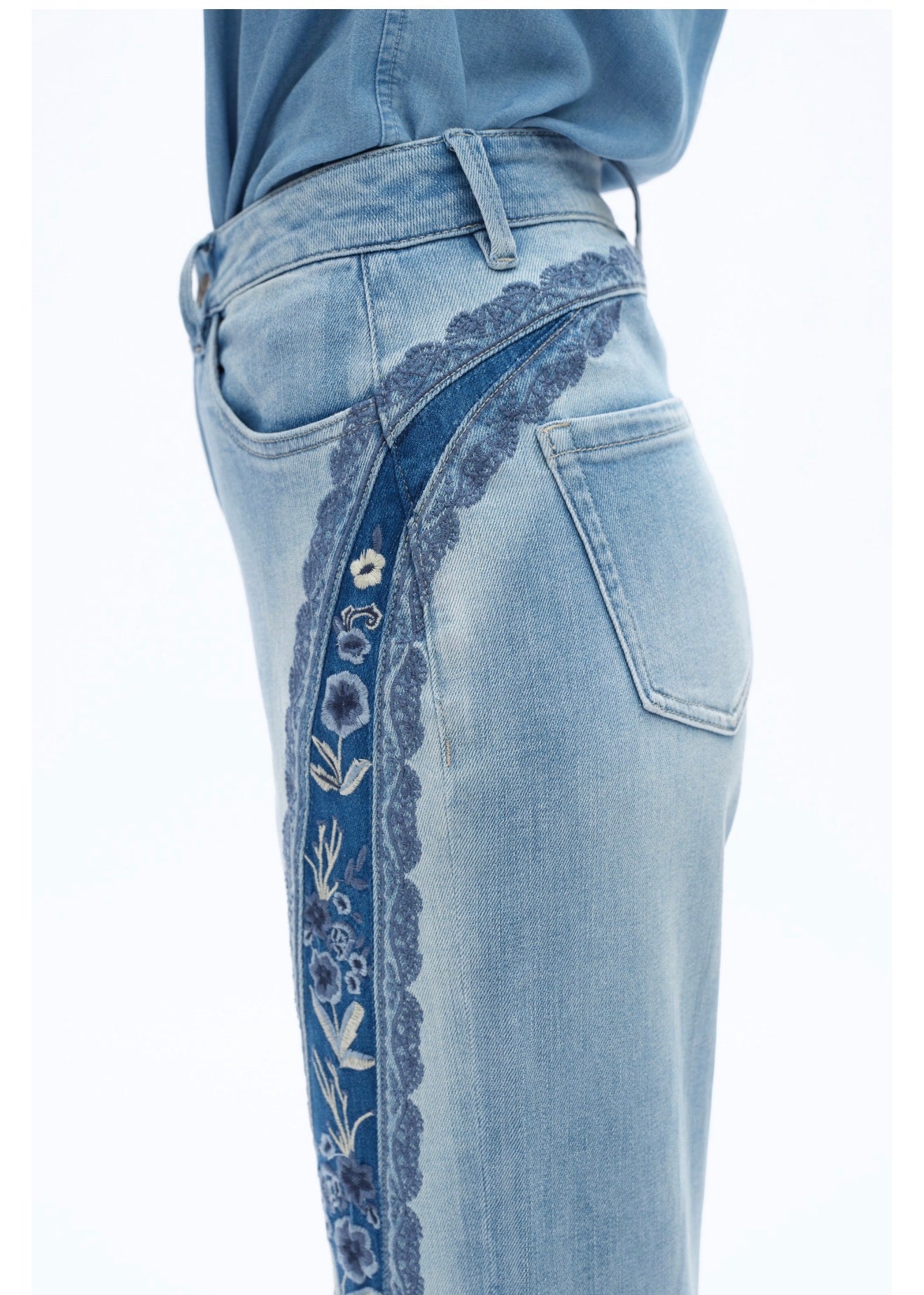 Erika Embroidered Patchwork Jean – artisan floral embroidery panel, high-rise wide-leg jean, side view, Spirit & Wind Boutique

