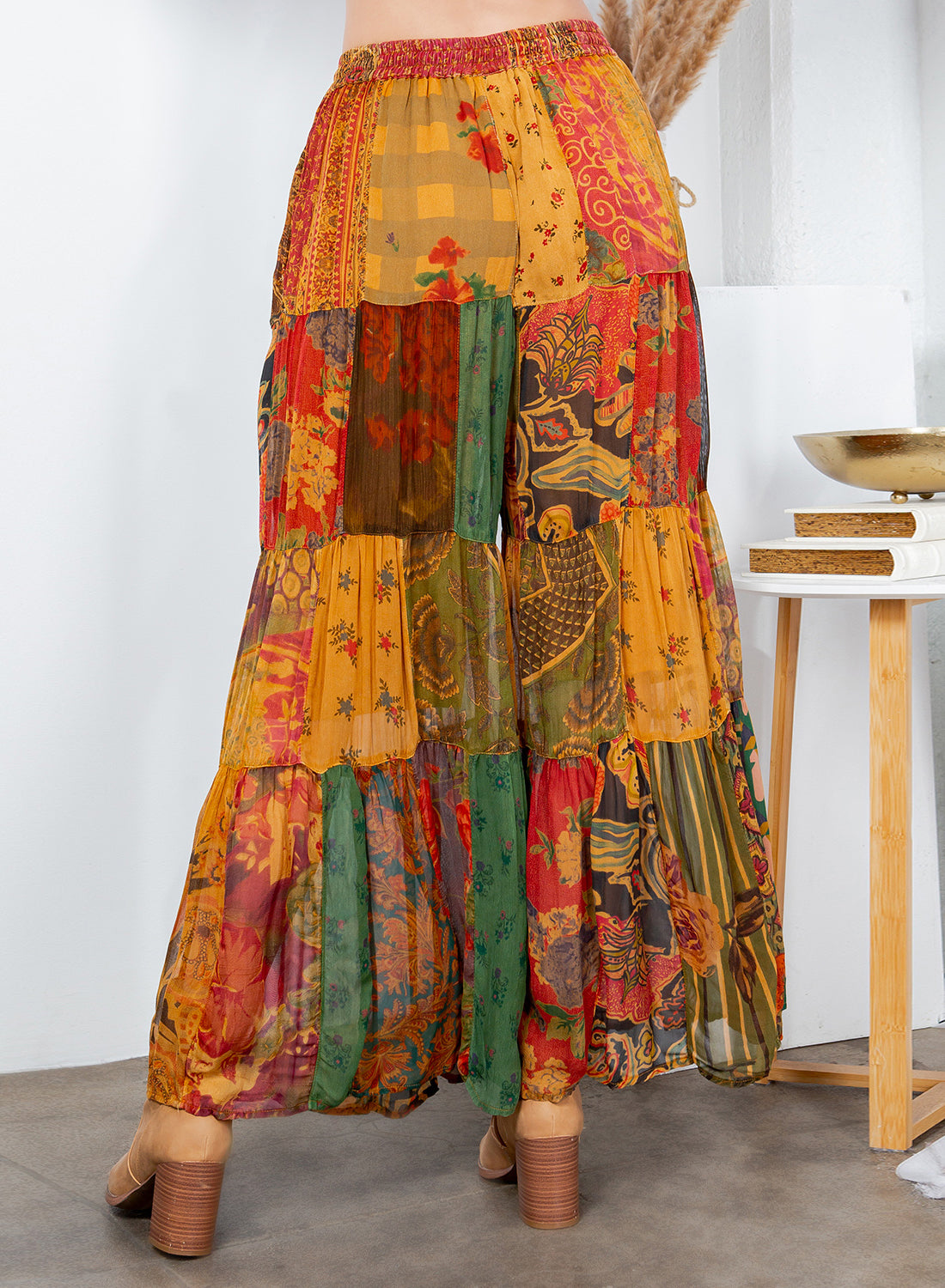 Colorful patchwork pants with a white background