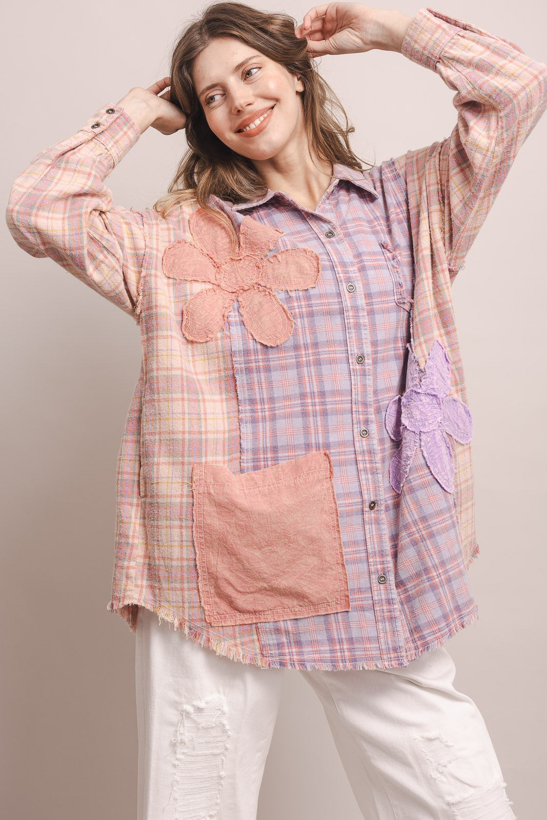 Lifestyle front shot, model smiling, styled with white jeans