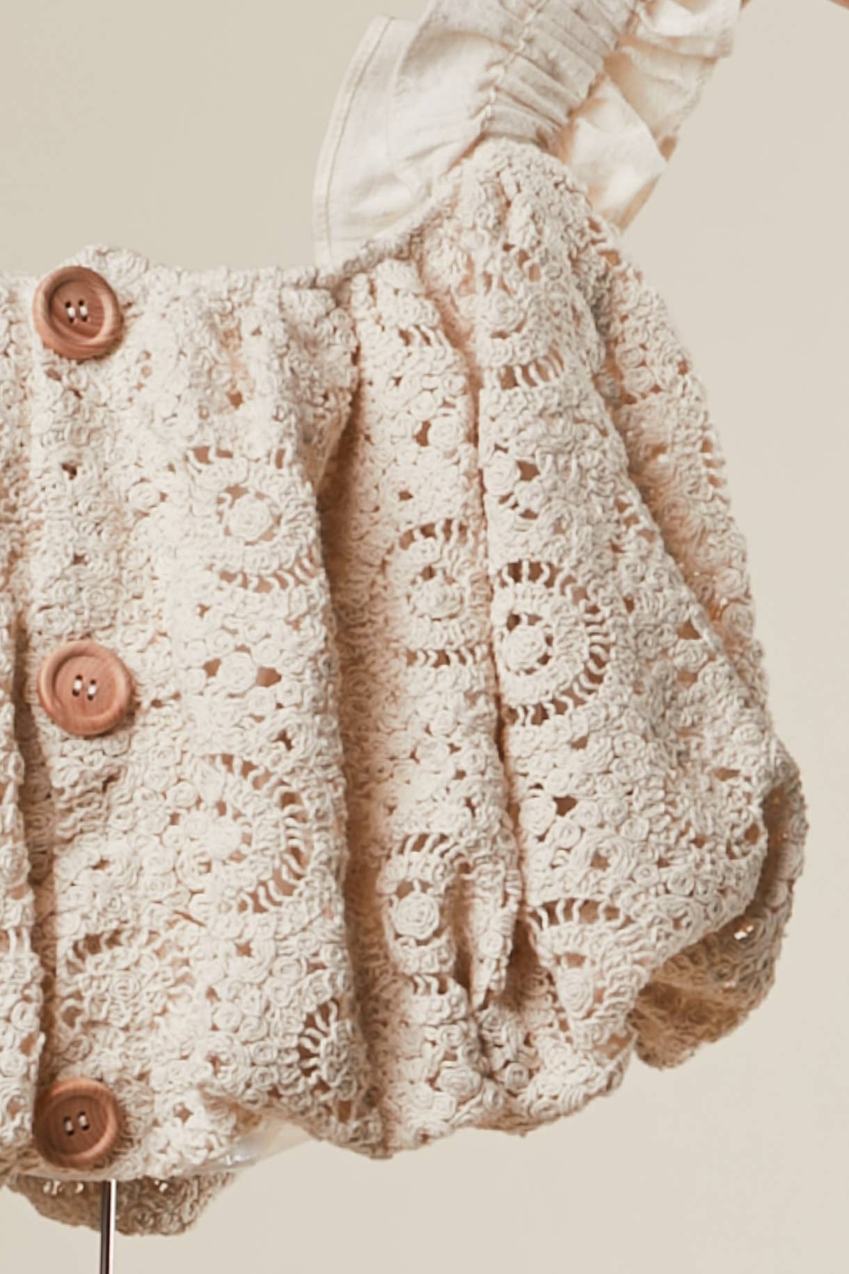 Sweet Innocence top button detail - vintage-inspired button-down front on romantic lace crop