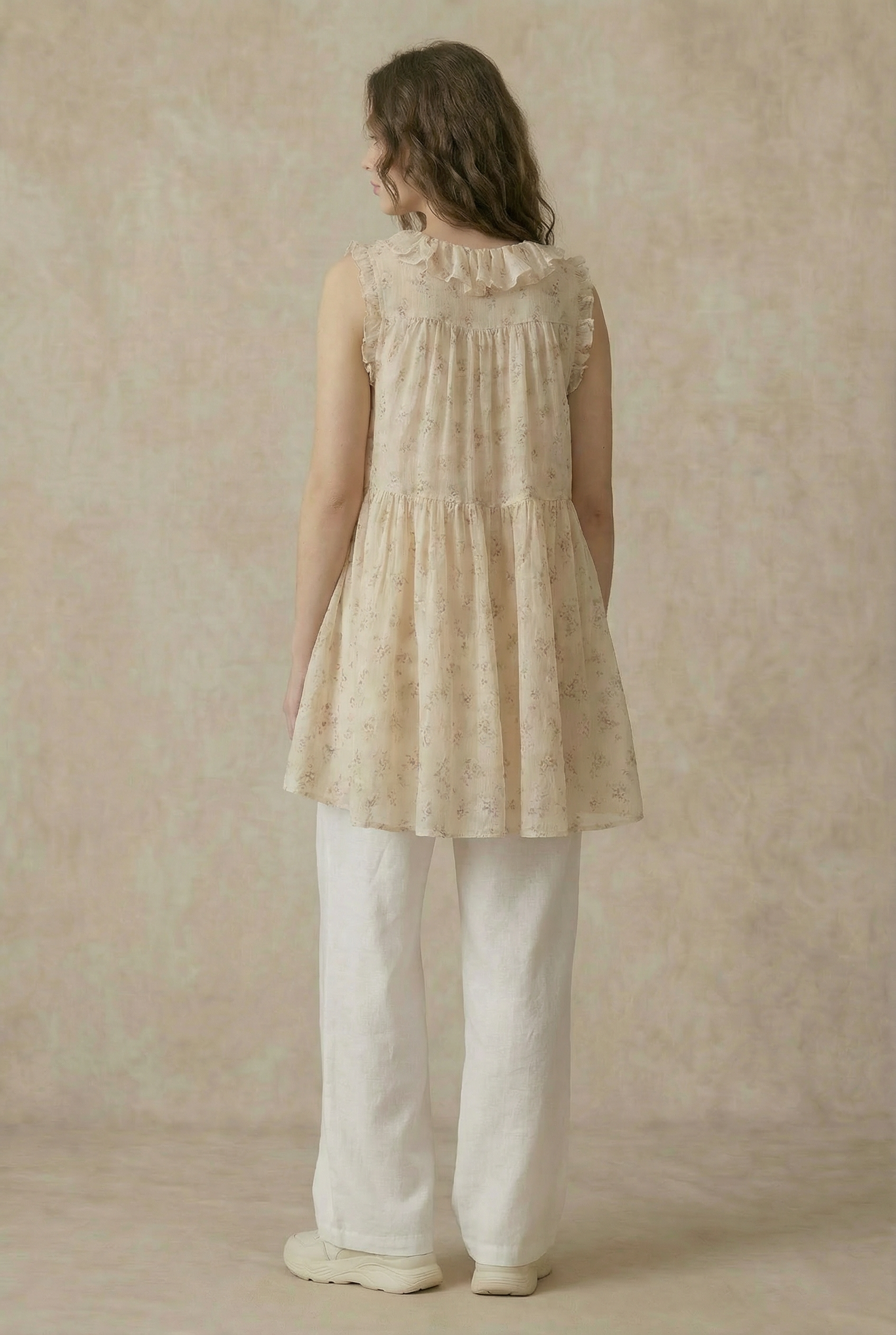 Enchanted Garden tunic styled - whimsical floral ruffled top with effortless boho-luxe elegance

