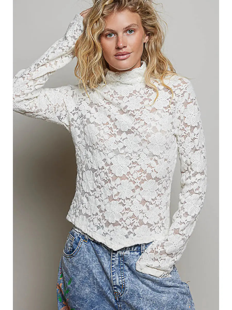 front close-up — cream floral lace mock neck top with acid wash jeans