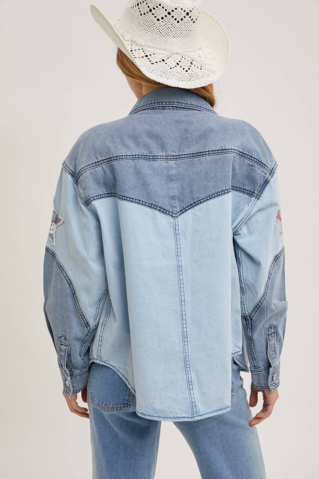 Two-tone denim button-down jacket featuring patriotic star appliqués on pocket and sleeve