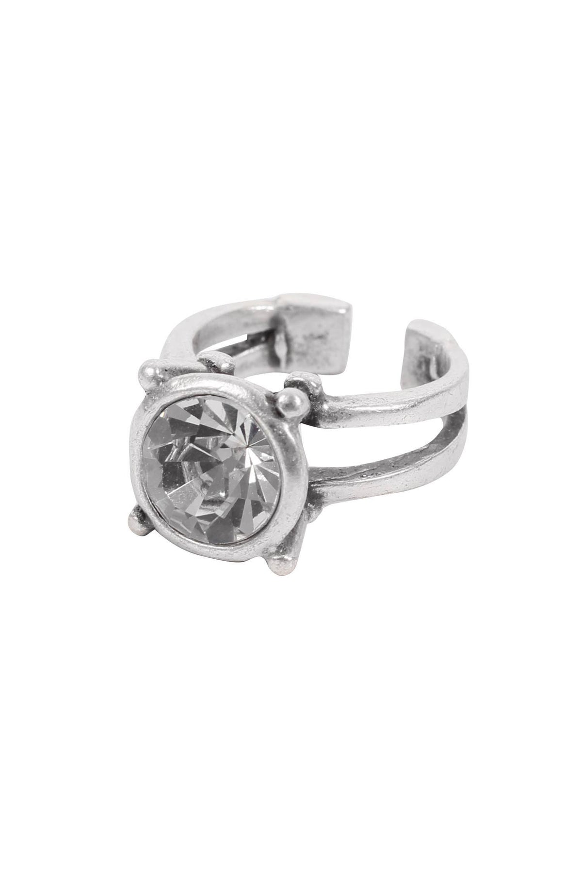 Silver ring with a clear gemstone on a white background