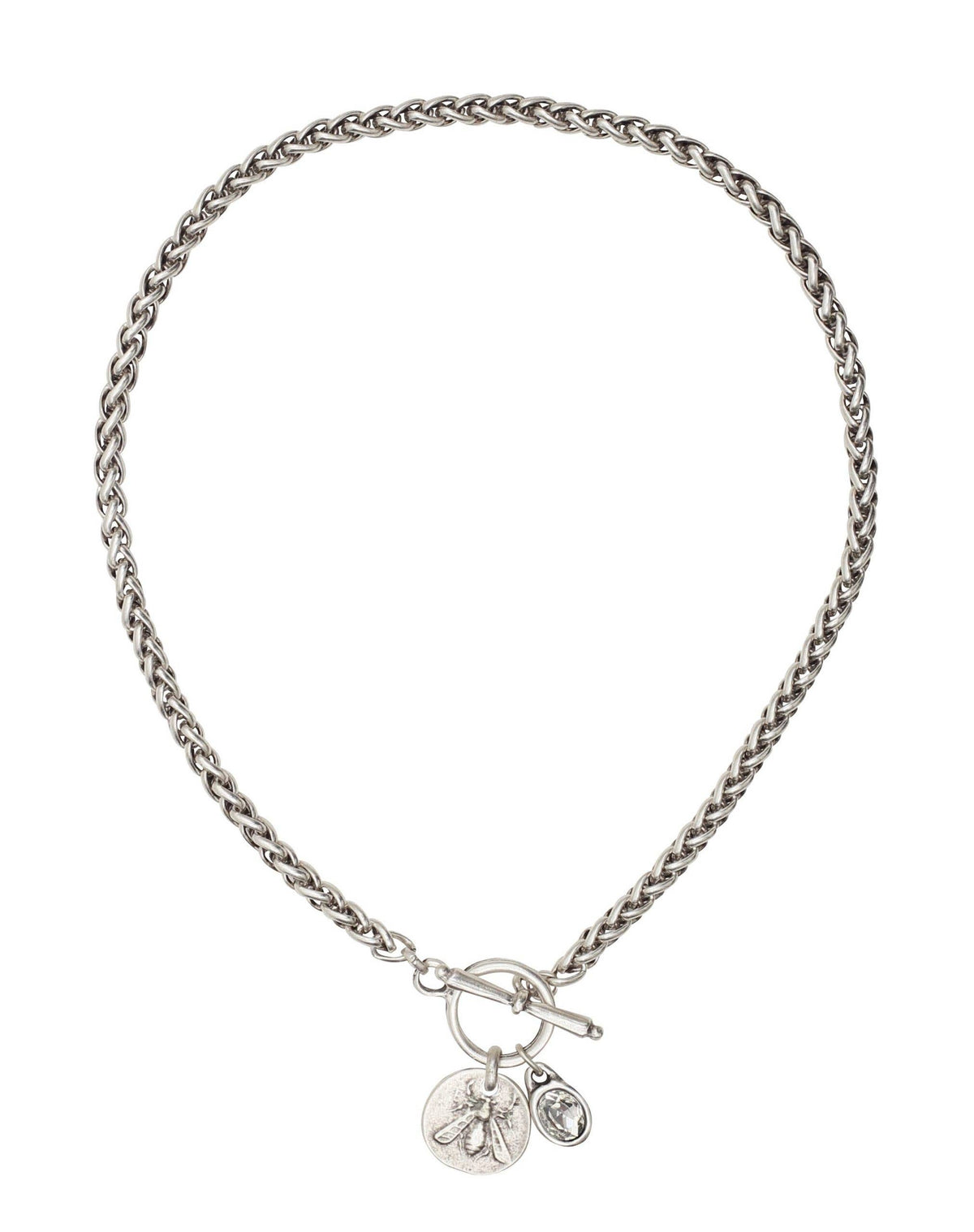 Silver chain necklace with bee charm and crystal on a white background