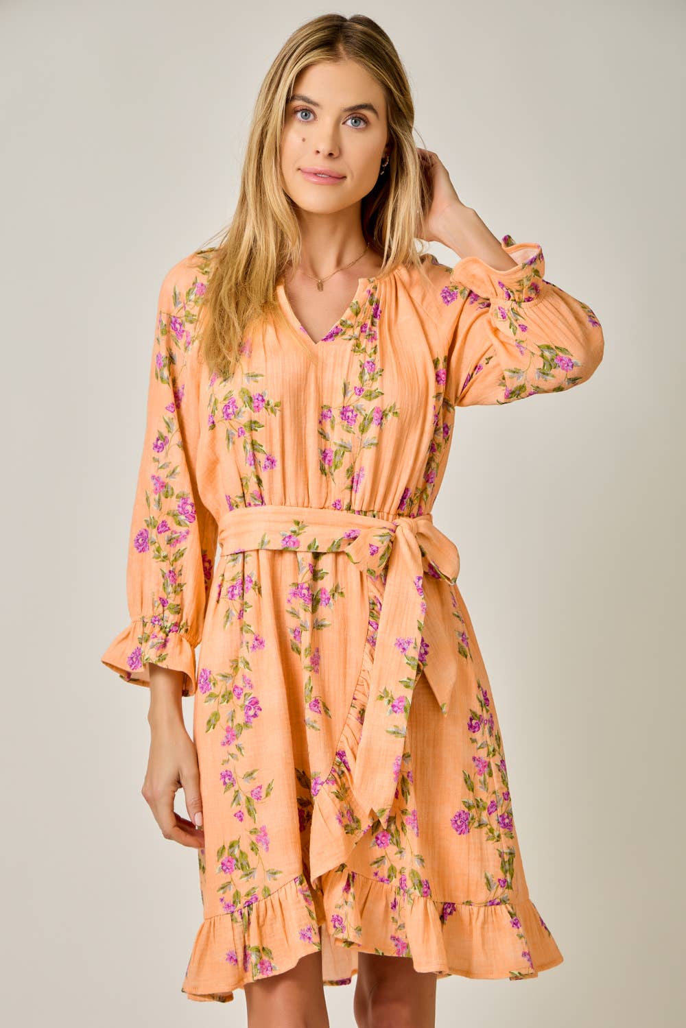The Valencia Floral Wrap Dress in Sherbet Orange - front view showing vibrant floral print 