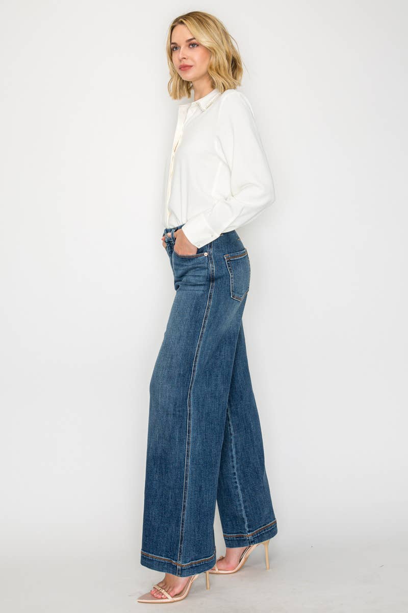 High-rise palazzo jeans detail - close-up of V belt loop detailing and flattering wide-leg drape

