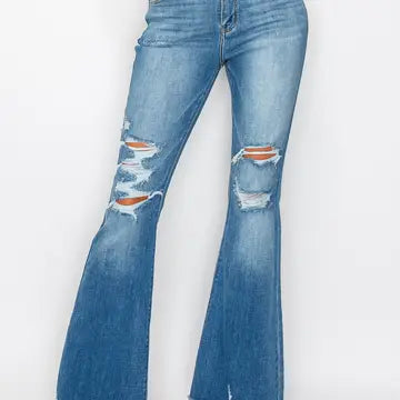 Front view — medium-wash high-rise distressed flare jeans with ripped knees, raw frayed hem, 5-pocket style on model.