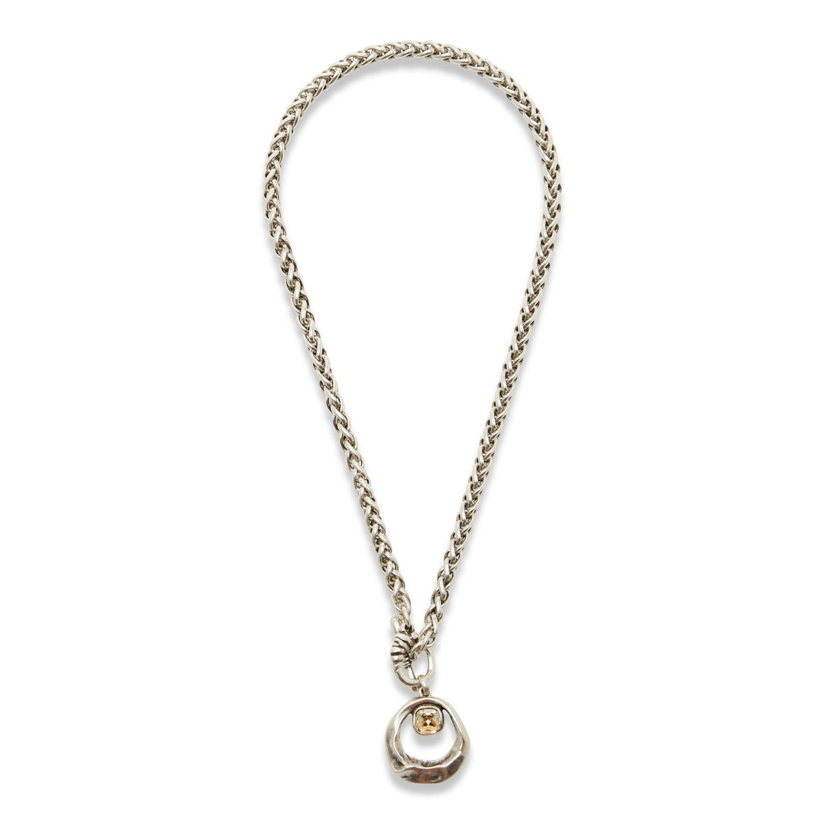 A silver-toned chain necklace with a unique circular pendant featuring a small gold cross in the center, displayed on a clean white background.