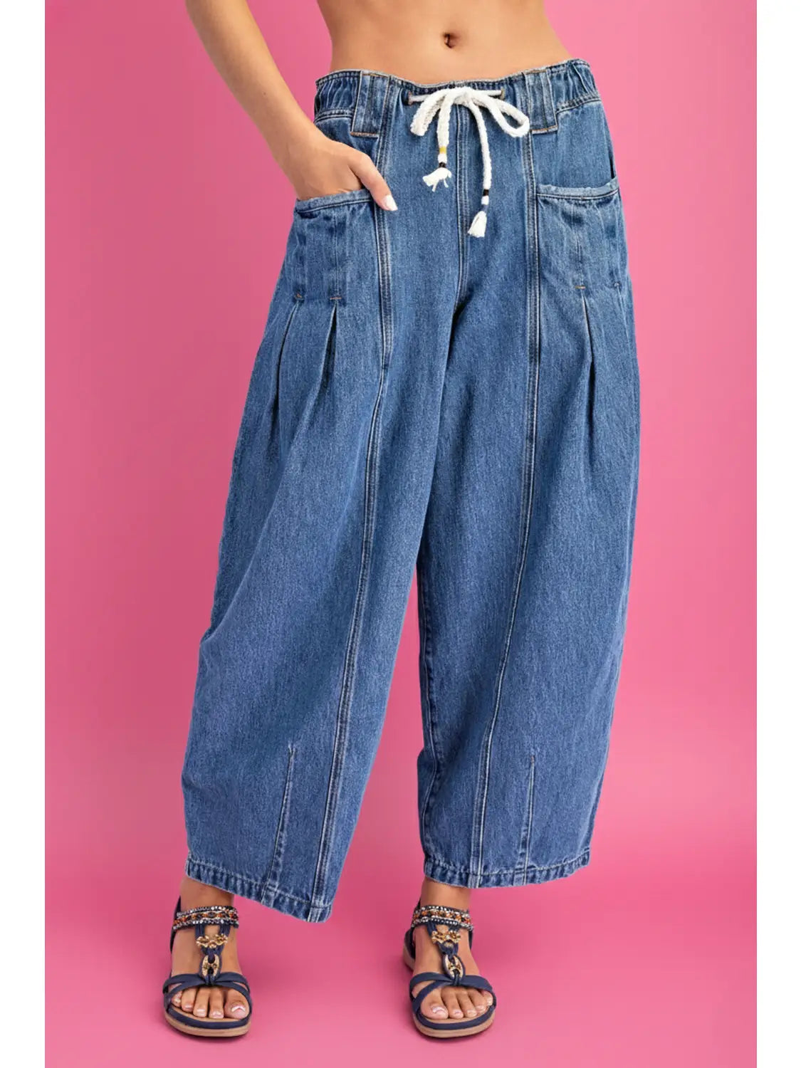 The Paloma Barrel Jean — low-slung wide barrel silhouette with corded drawstring waist and seamed paneling, boho-luxe pull-on denim by Cotierra