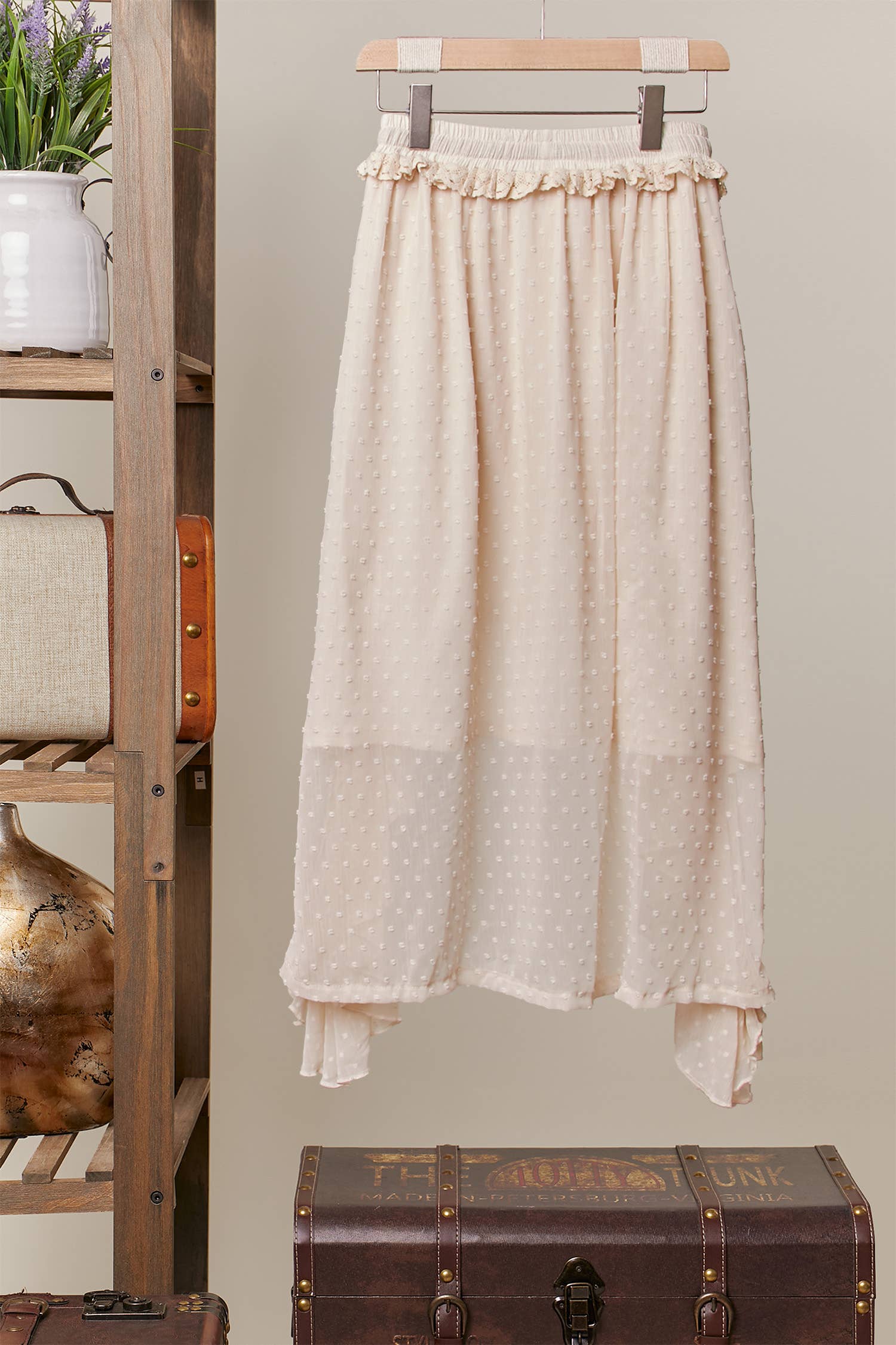 Ruffled maxi skirt back view - high-low hemline with cascading tiered layers and artisan detailing