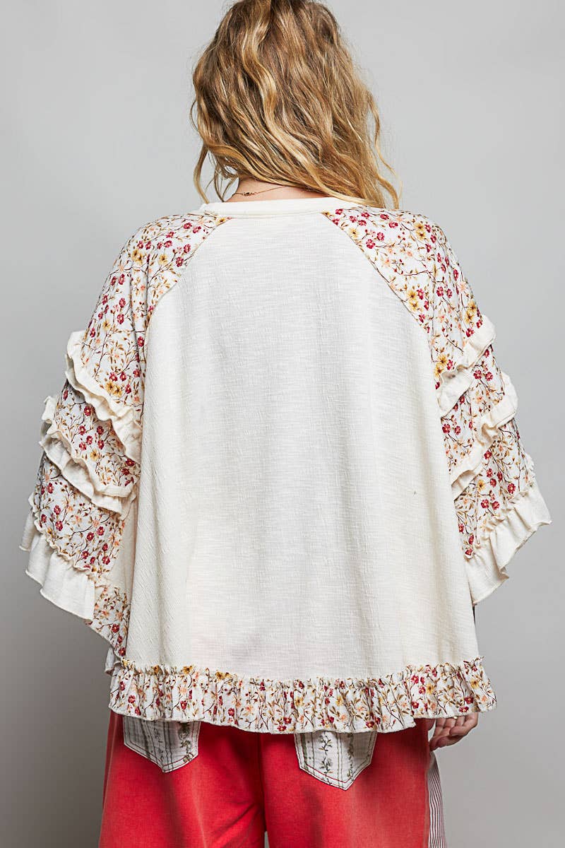 ina's Boho Floral Lace Top in Natural – back view showing natural linen panel with pink floral raglan sleeves and ruffled hem trim