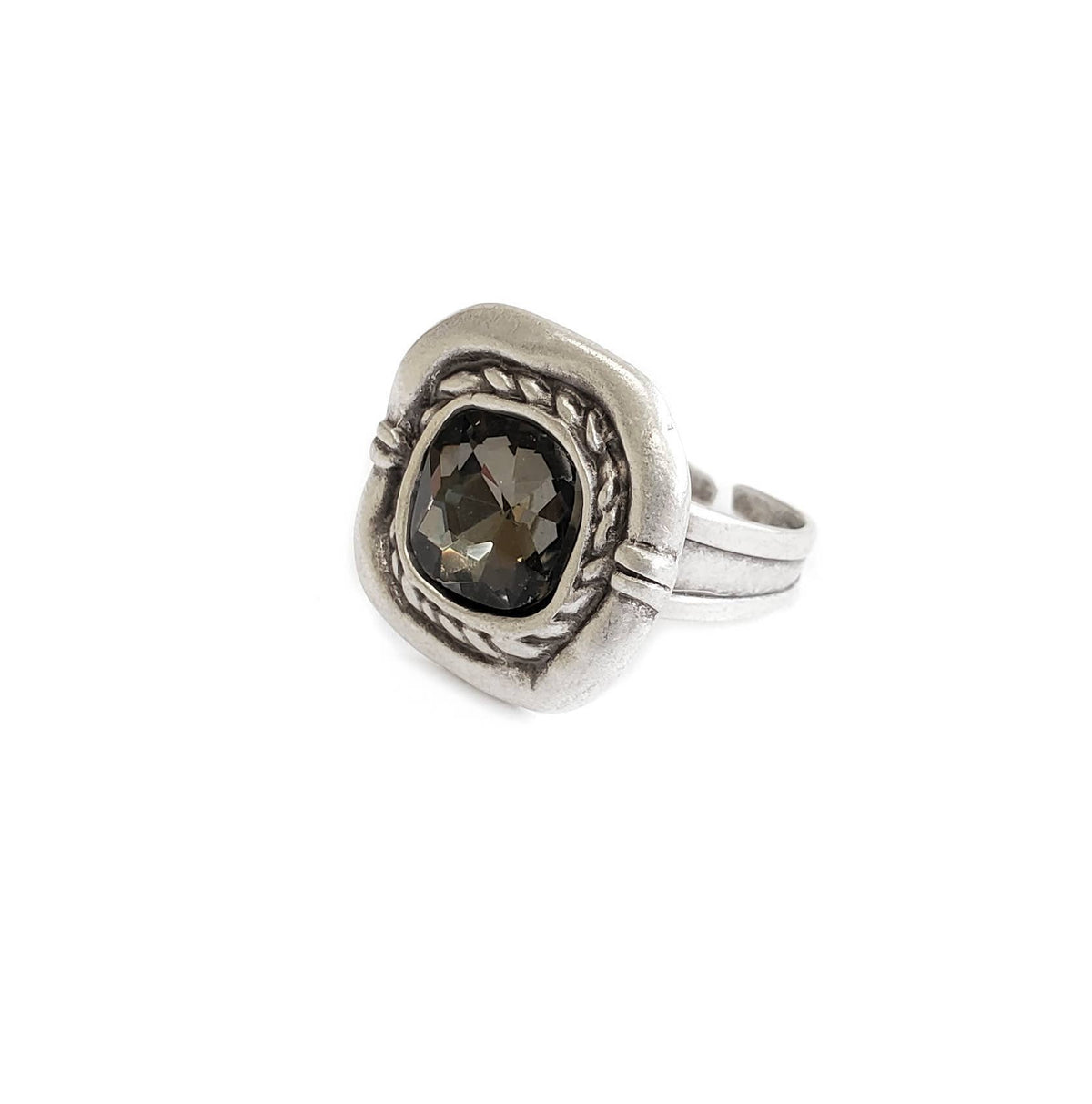 A silver-toned ring featuring a square bezel-set dark brown smoky gemstone, detailed with twisted rope-like borders around the setting, shown on a plain white background.