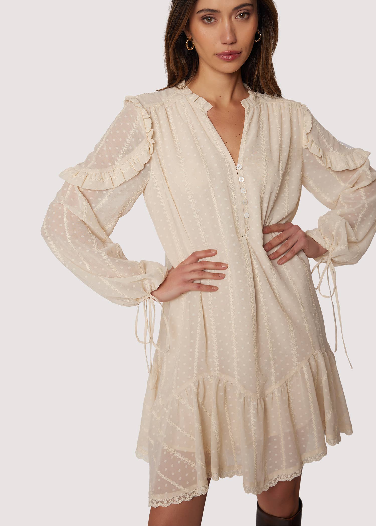 Boho ivory mini dress—V-neck, long blouson sleeves with ties, ruffle details, lace-trimmed hem