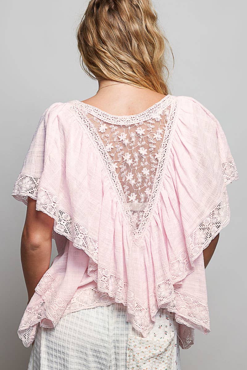 Back view Pink reversible embroidered lace trim ruffle top — boho-luxe style
