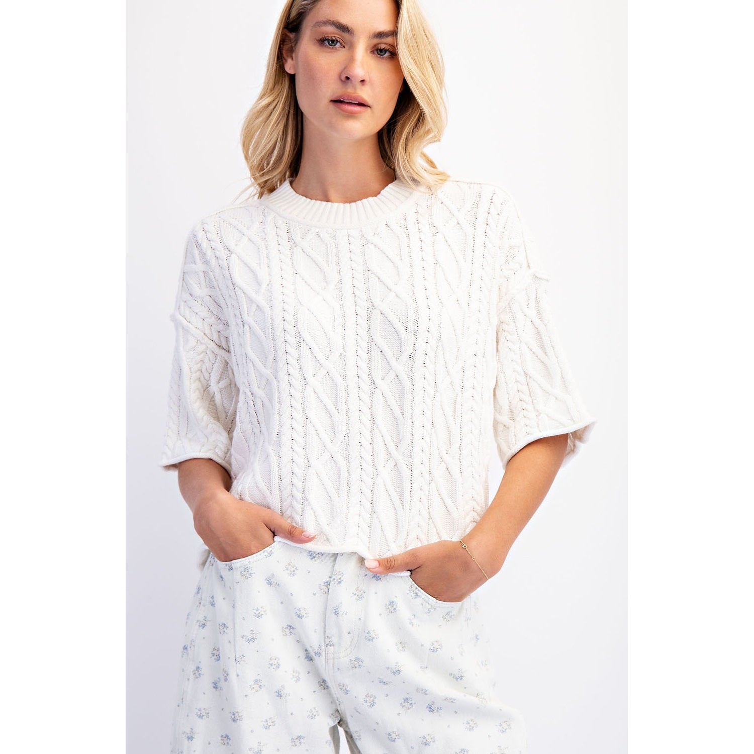 The Cove Oversized Sweater in Off White — front view, slouchy cable knit with dropped shoulders and asymmetrical hem in off white