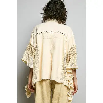 Crochet Lace Ruffle Gauze Shirt in Cream – back view showing open crochet lace panel inserts, stud collar detail, and cascading ruffle hem