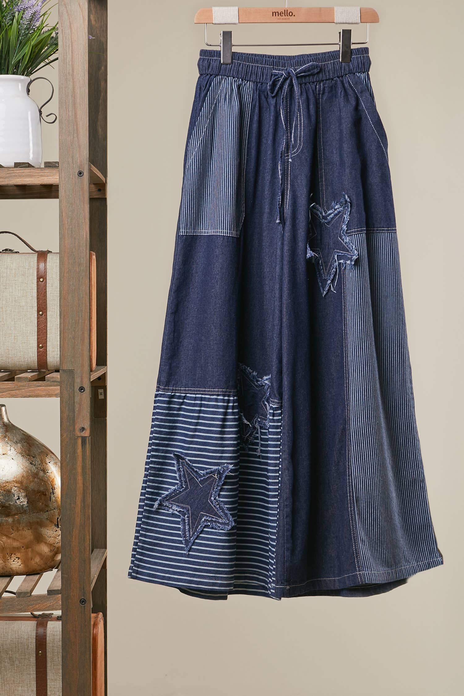 Blue Star Wide Leg Patchwork Denim Pants in dark blue wash with frayed star patches, elastic waist and drawstring — boho wide leg style by Mello