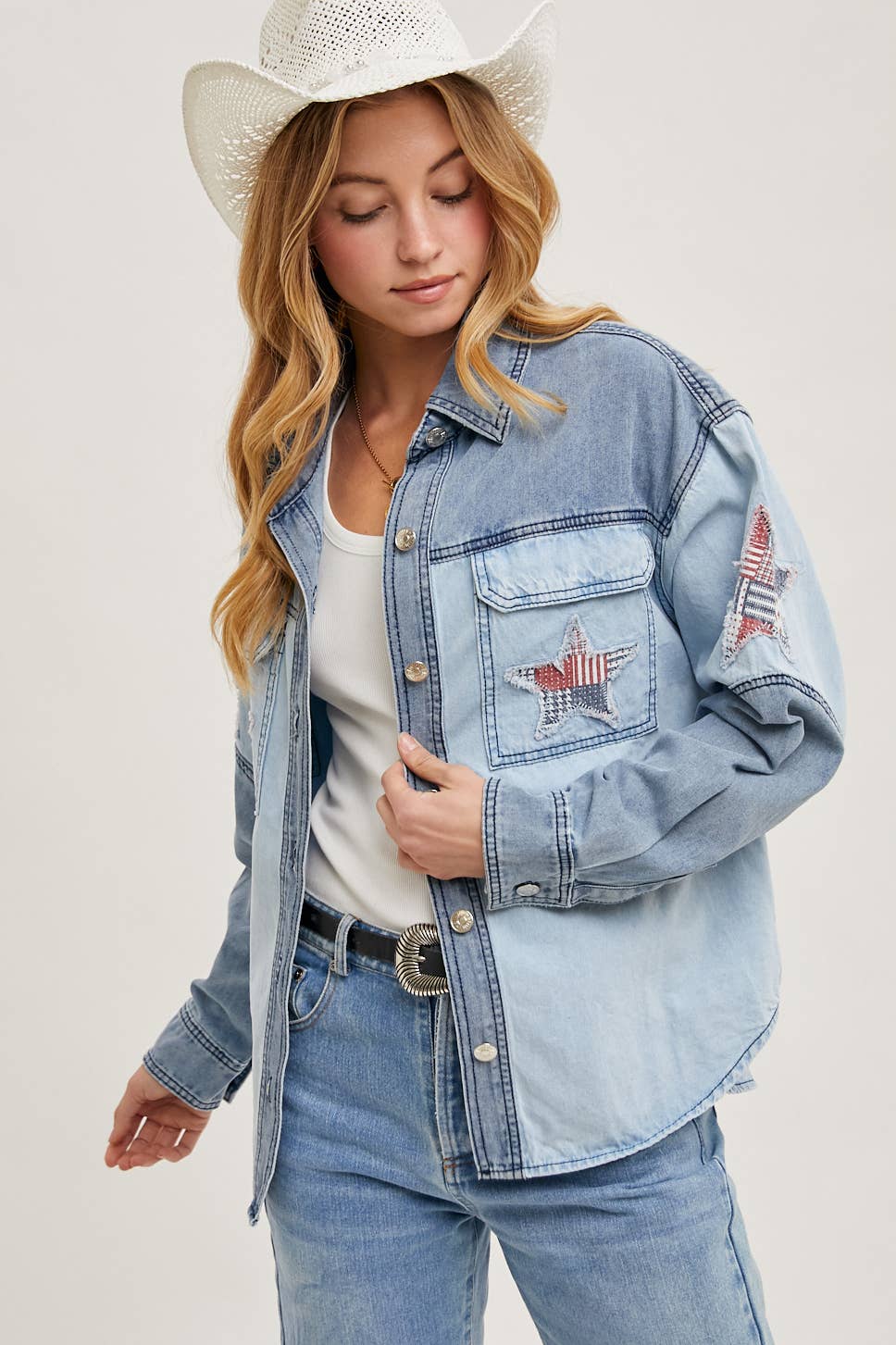 Two-tone denim button-down jacket featuring patriotic star appliqués on pocket and sleeve