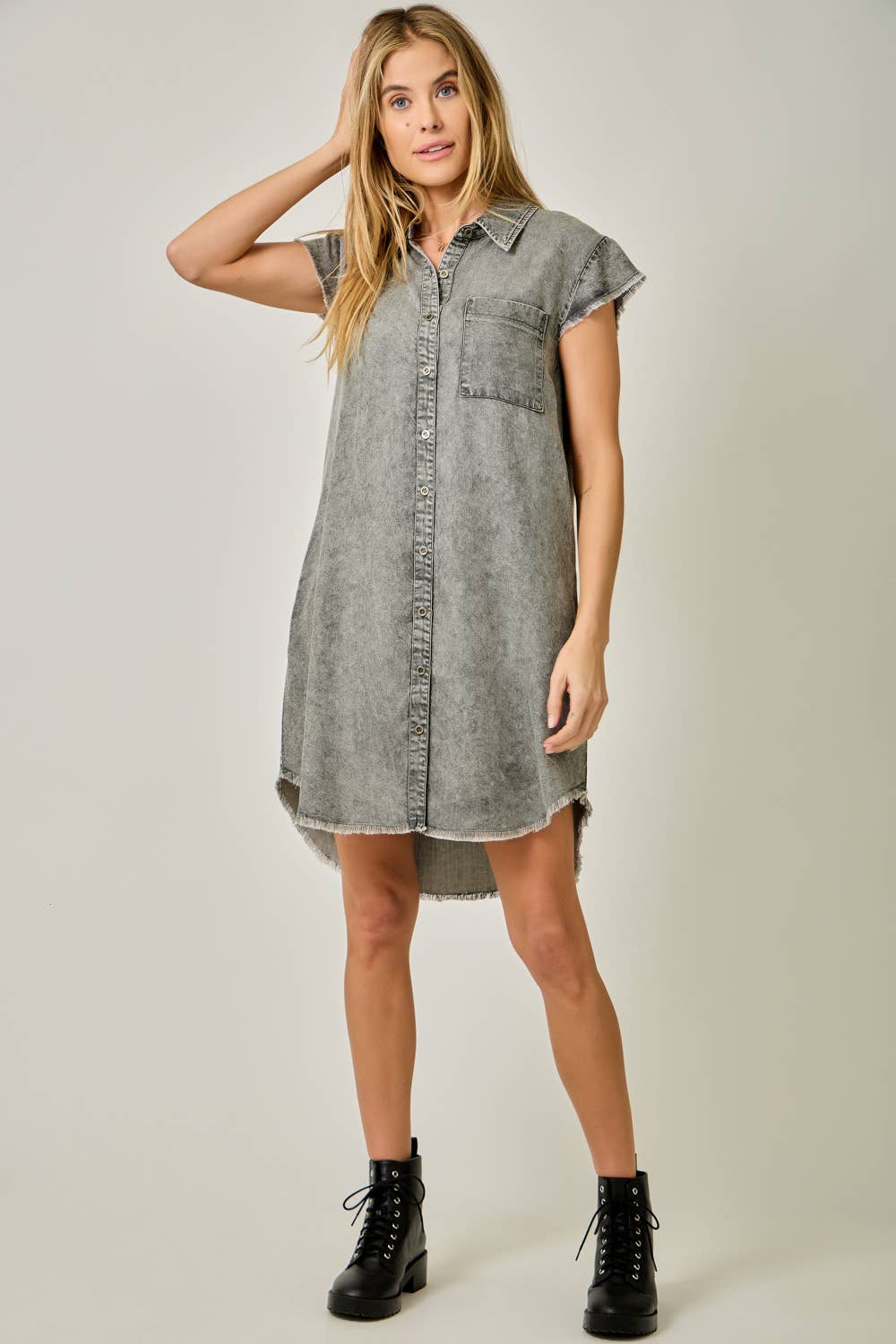 Fringe Hem Tencel Shirt Dress in Washed Black — button-down front, flutter cap sleeves, fringed hi-lo hem, and side pockets

