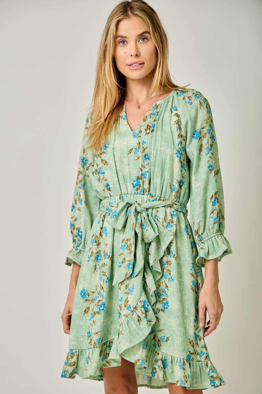 The Valencia Floral Wrap Dress - full-length view highlighting wrap silhouette and 3/4 bubble sleeves