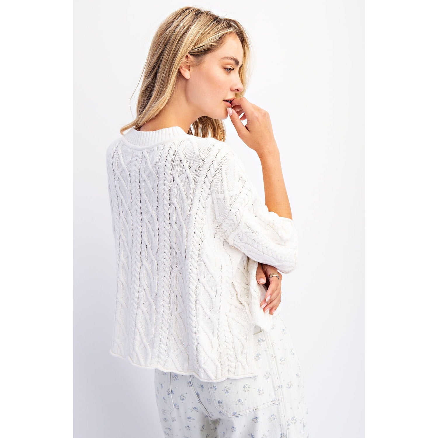 Back view of The Cove Oversized Sweater in Off White — front view, slouchy cable knit with dropped shoulders and asymmetrical hem in off white