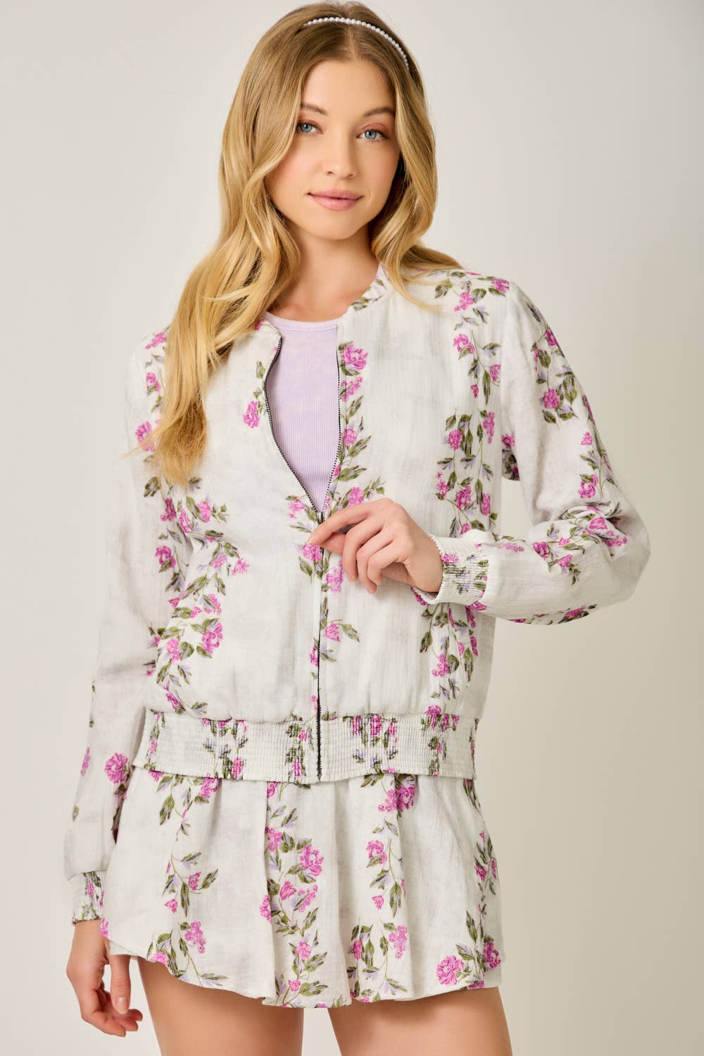 The Rosewood Floral Bomber - full-length view highlighting smocked elastic waist and bomber silhouette