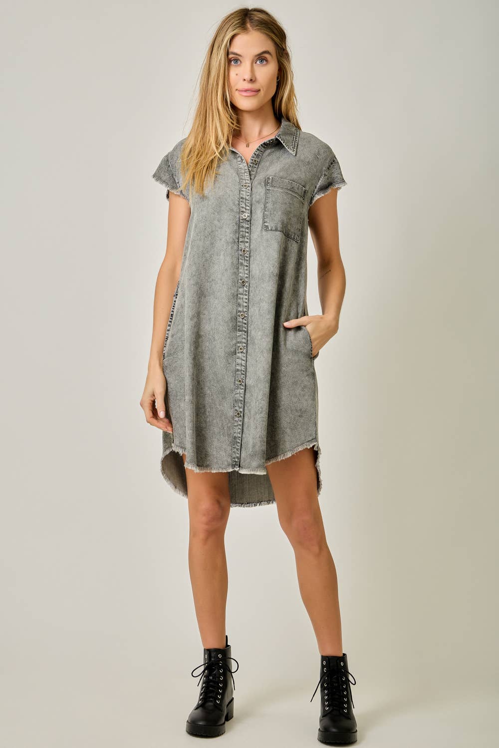 Fringe Hem Tencel Shirt Dress in Washed Black — button-down front, flutter cap sleeves, fringed hi-lo hem, and side pockets

