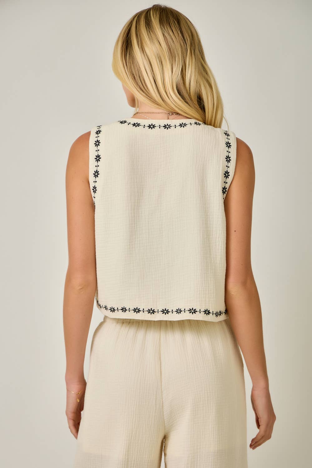 Back view  Embroidered Cotton Gauze Tie-Front Vest in Ivory — open front with tie, V-neckline, and delicate embroidery detail

