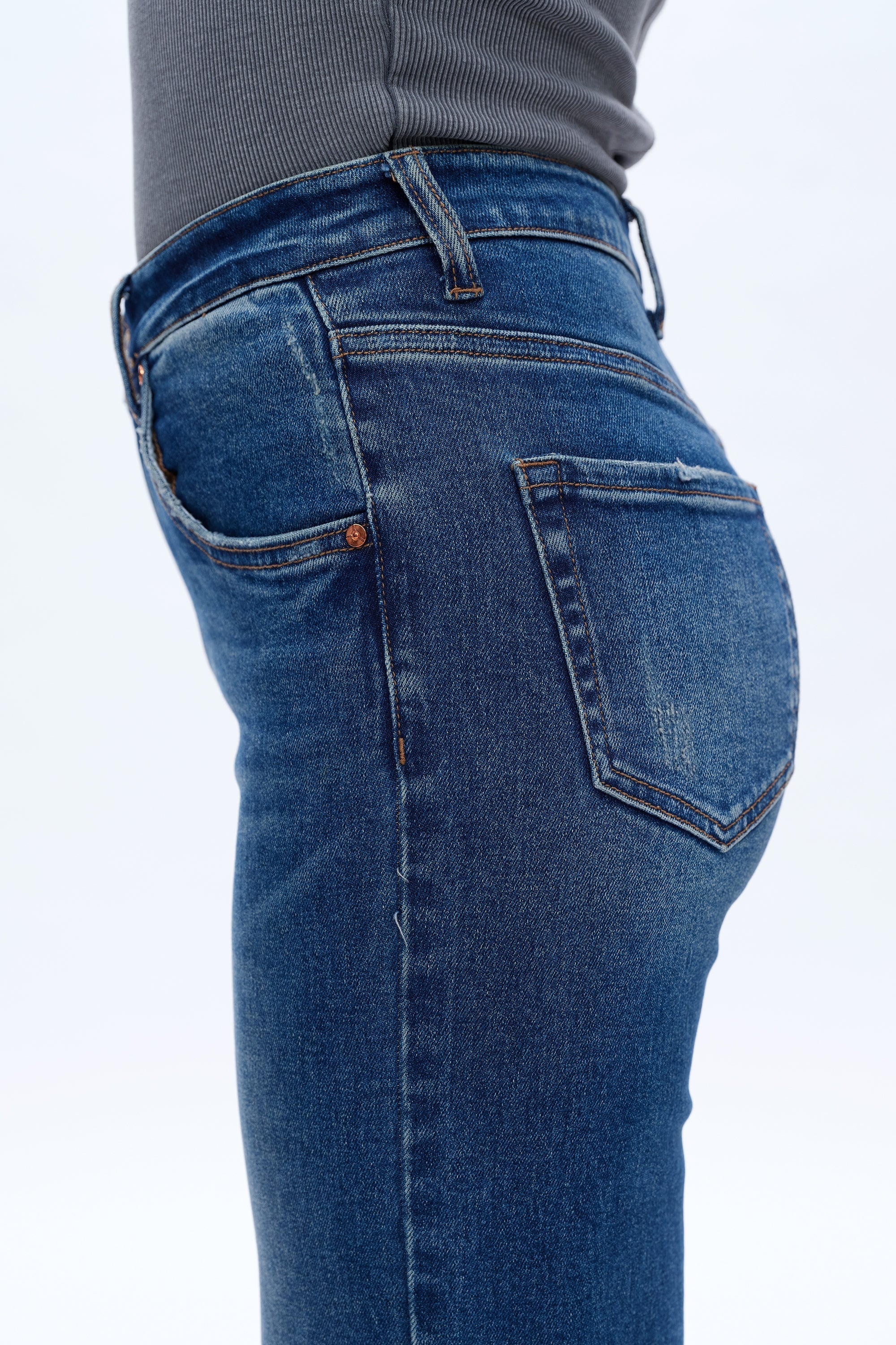 Blue jeans with a plain background